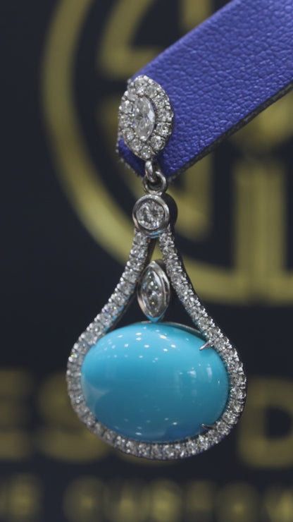 14K white gold tourmaline diamond halo drop earrings with pavé diamond frame and blue cabochon tourmaline center