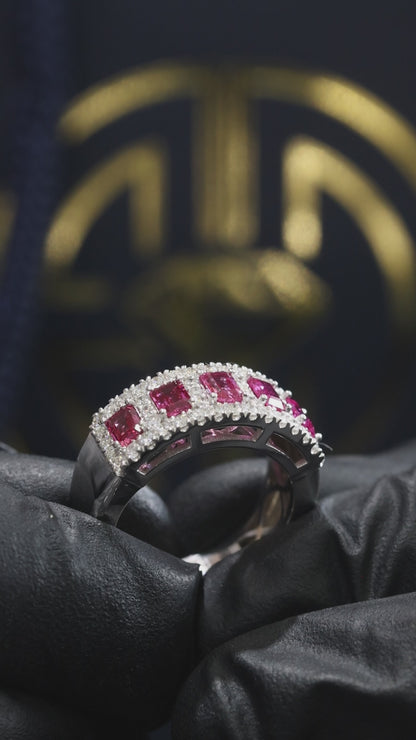 Crimson Gallery Ruby Eternity Band in White Gold | Emerald-Cut Rubies with Diamond Halo Rows