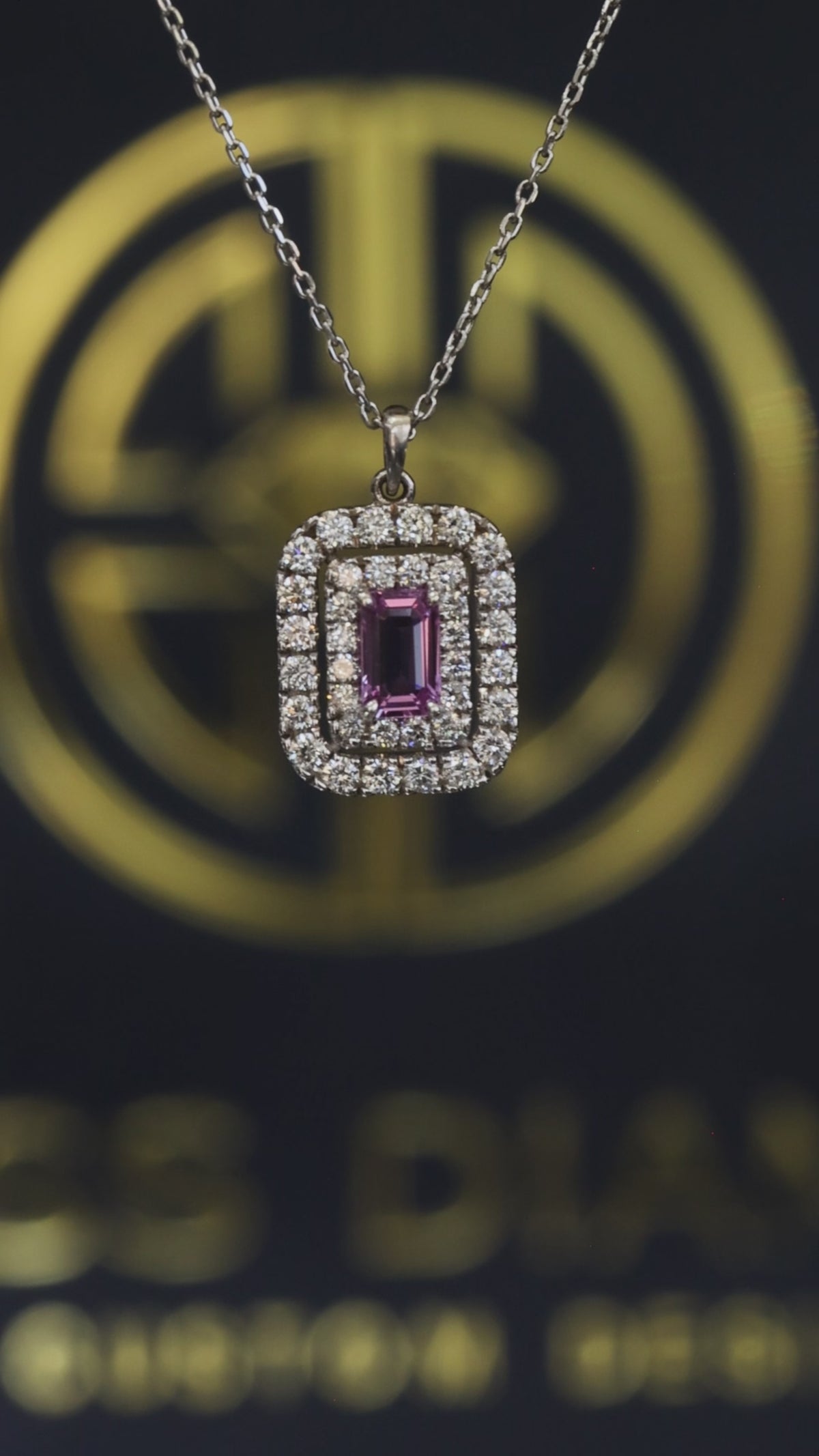 14K white gold sapphire halo pendant necklace with 0.30 carat emerald cut sapphire and 0.36 carat pavé diamond double frame design